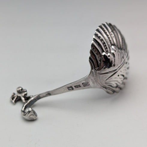 Circa 1890 Swiss antique sterling silver tea caddy spoon with shell and angel decoration